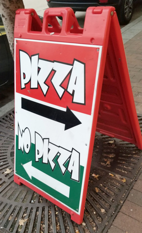 The information street sign for Pizza Parma